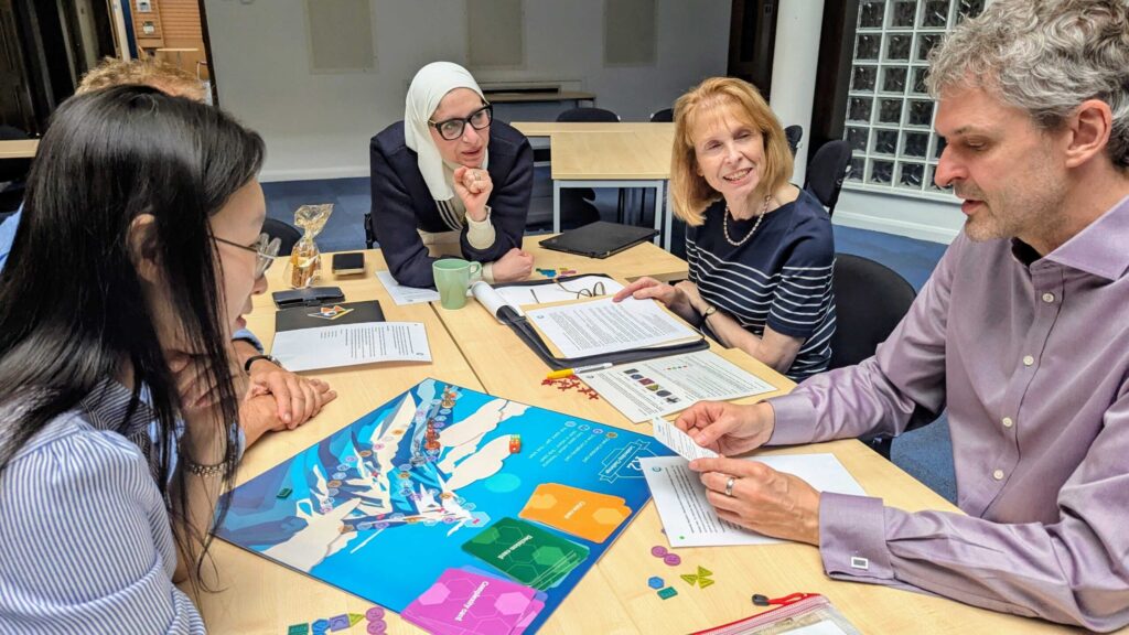 Cranfield staff taking part in a K2 board game session