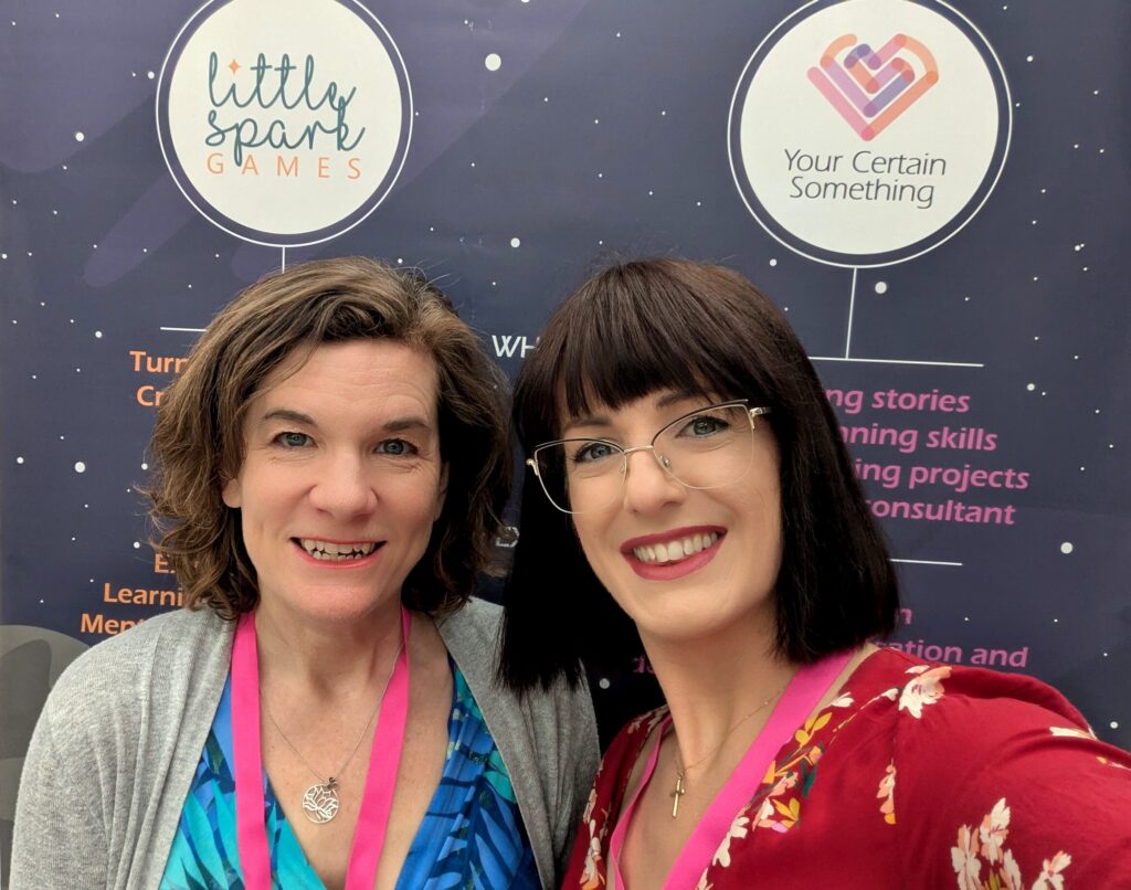 Nicci and I in front of our stall's banner