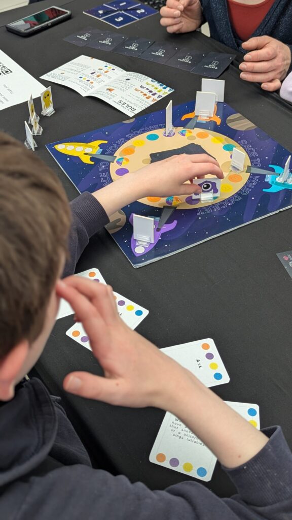 Young child playing Race To Your Rocket